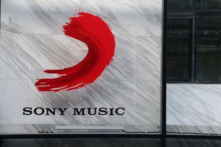 Sony Music logo displayed on a building wall.